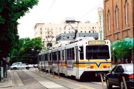 Sacramento's LRT shares one lane with traffic along 12th St.