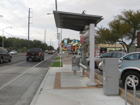 MetroRapid bus stops are currently designed to be modular and movable, and could be relocated to other routes or to use by urban rail. But civic officials and Project Connect representatives portray MetroRapid bus service as "permanent" form of "rapid transit" that "blocks" urban rail. Photo: L. Henry.