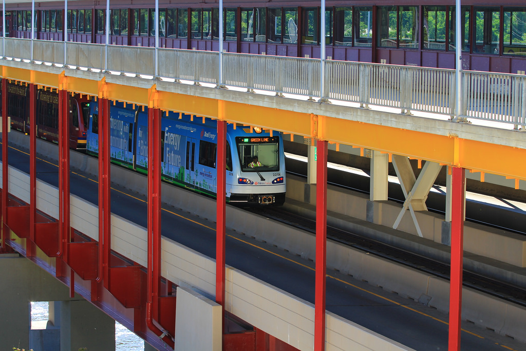 Green Line train crosses over Mississippi River on newly retrofitted Washington Ave. bridge. Photo: Streets.mn.
