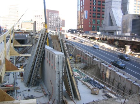 Boston's "Big Dig" under construction past city's CBD. Project re-routed I-93 Central Artery into a central-city tunnel. Source: Imaginerpe.com.